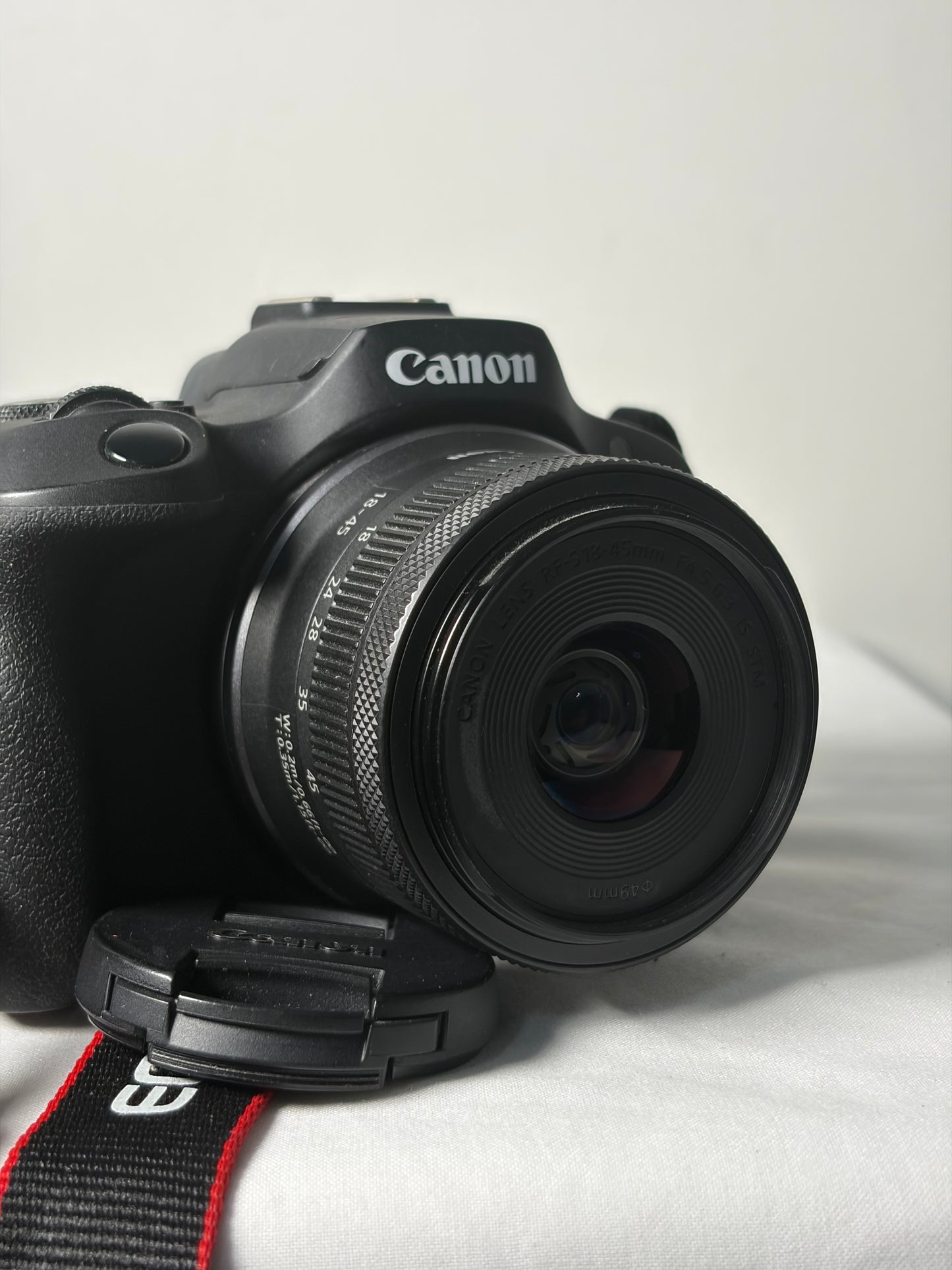 Appareil photo numérique hybride Canon EOS R100 + objectif 18-45 mm